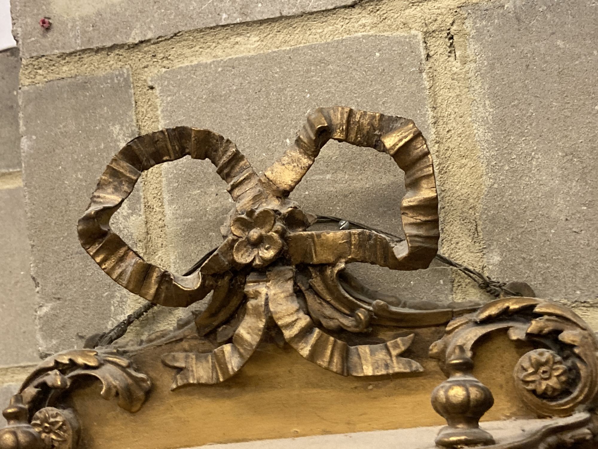 A Victorian gilt carved wood and gesso four tier mirrored bracket, width 70cm, depth 17cm, height 90cm